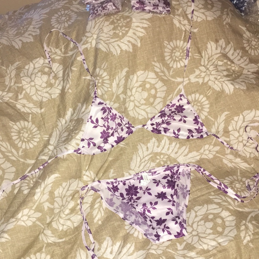 Purple and white floral bathing suit